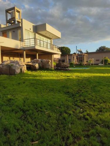 Κήπος έξω από το Casa Nature View Golf Sierra de los Padres Mar del Plata