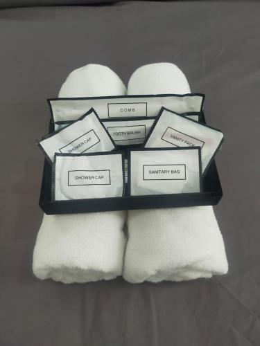 a group of towels sitting on top of a sink at The Ambiance, Melaka in Melaka