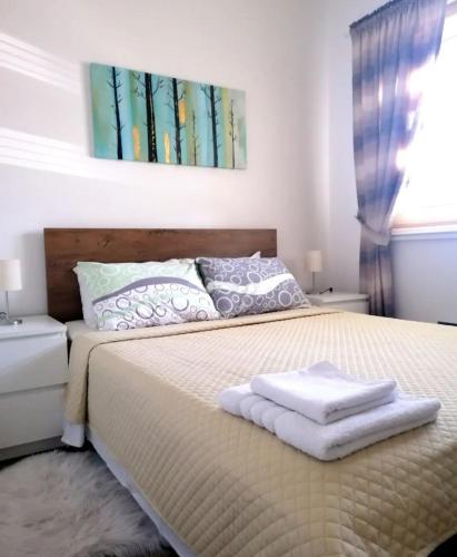 Una cama o camas en una habitación de Serbona