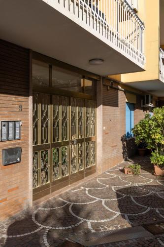 a building with a large window with a design on it at Citrus Home in Meta