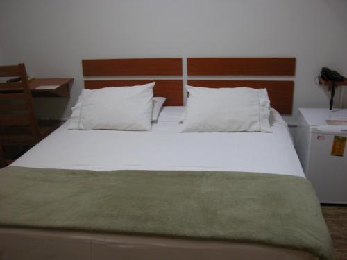 Katil atau katil-katil dalam bilik di Hotel Avenida Tupã
