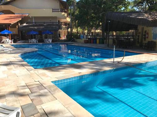 Πισίνα στο ή κοντά στο Flat Amarilis em Riviera de São Lourenço, Completo, com Serviço de Hotelaria, Enxoval e Arrumação