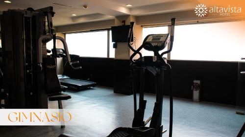 a room with a gym with a treadmill at Altavista Hotel in Reynosa