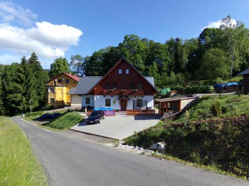 a house on the side of a road at Apartment Nedrik in Rokytnice nad Jizerou