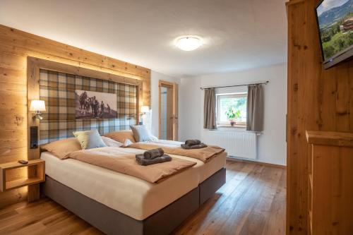 Postel nebo postele na pokoji v ubytování Ferienwohnung Schwabegghof
