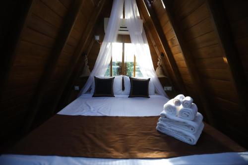 Postel nebo postele na pokoji v ubytování Cinnamon Paradise Cinnamon Room