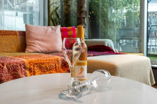 a bottle of wine sitting on top of a table at Pyjamagetaways in London