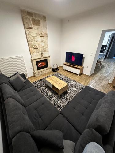 Posezení v ubytování AG.Stone.Home