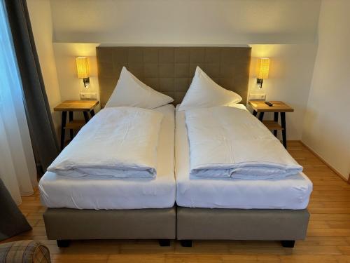 Cama o camas de una habitación en Alpen Glück Schlössl Unterm Rain