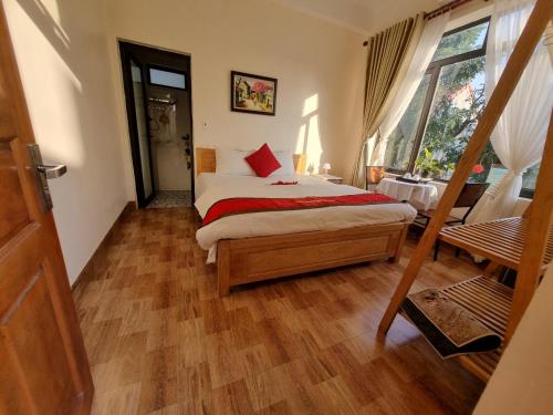 Postel nebo postele na pokoji v ubytování Phi Hung's Unique Homestay