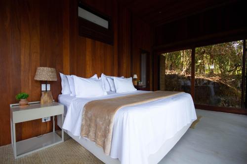 Giường trong phòng chung tại Casa Villa 16