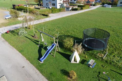 an aerial view of a park with a playground at Private Farmhouse Escape - Ideal for up to 8 Guests in Seeham
