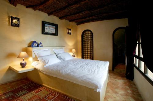 En eller flere senger på et rom på Villa Allun Essaouira