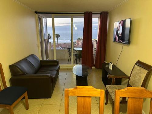 Departamento frente a la playaにあるテレビまたはエンターテインメントセンター
