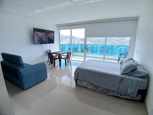 Ένα ή περισσότερα κρεβάτια σε δωμάτιο στο Apartamento Full Equipado Primera Linea de Playa