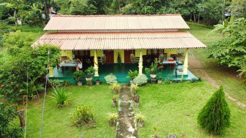 an aerial view of a house with a garden at Panoramic Royal Villa in Sigiriya