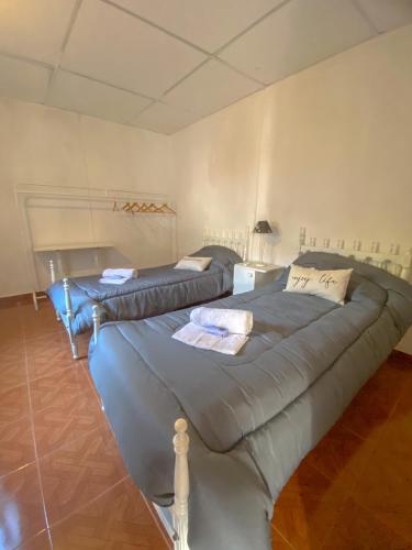 Postel nebo postele na pokoji v ubytování Casa Candiotti