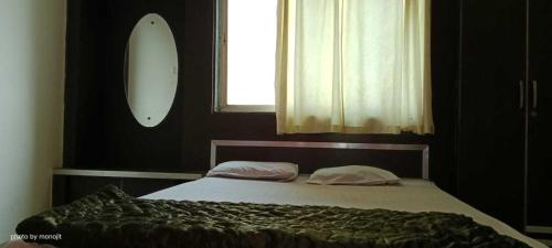 Lova arba lovos apgyvendinimo įstaigoje OYO Hotel Khandesh