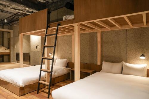 Ένα ή περισσότερα κρεβάτια σε δωμάτιο στο Green Room Hotel