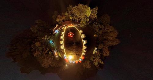 an overhead view of a christmas tree with lights at ELA Glamping Madikeri in Madikeri