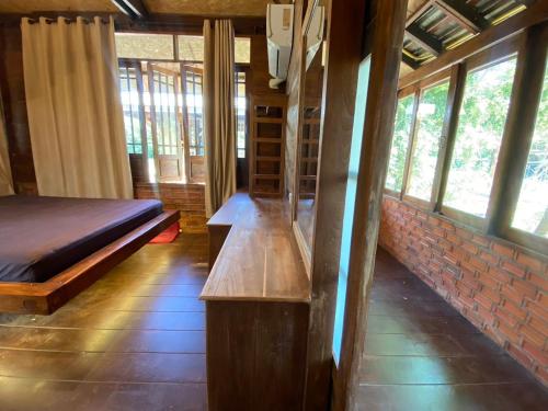 Katil atau katil-katil dalam bilik di Tasana Garden Saraphi ทาซาน่าการ์เด้น สาขาสารภี