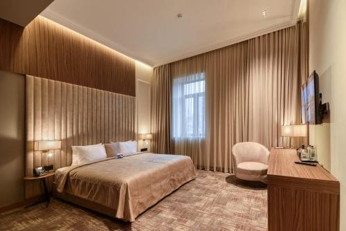 Hayasa Hotel Yerevanにあるベッド