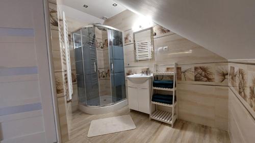 Et badeværelse på Apartament u Beni