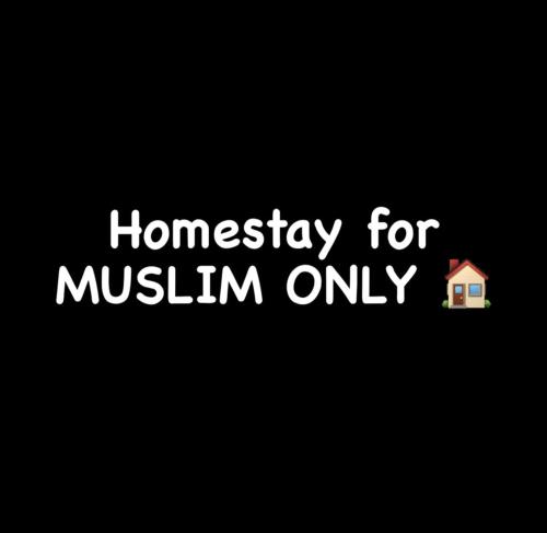 a sign that says homepage for muslin only with a house at Pantai Puteri Melaka - Seaview 2 Bedroom in Kampong Pantai Dusun