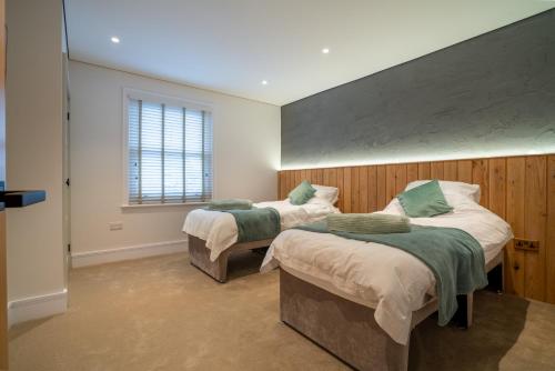 Ένα ή περισσότερα κρεβάτια σε δωμάτιο στο Hazelwick Apartment