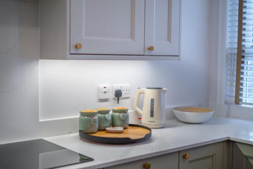 Η κουζίνα ή μικρή κουζίνα στο Hazelwick Apartment