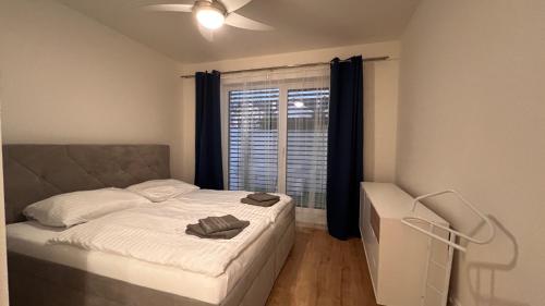 Voodi või voodid majutusasutuse Klimatizovaný Apartmánový dom s vírivkou, 10B toas