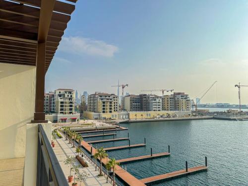 a view of a river with buildings and a city at HiGuests - Family Dream Escape with Private Beach Access in Dubai