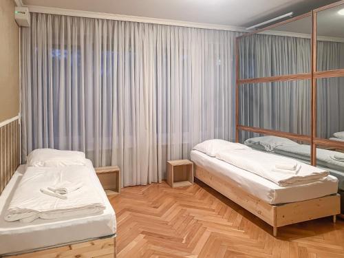 เตียงในห้องที่ T&K Apartments - Erkrath - 4 Zimmer Apartments