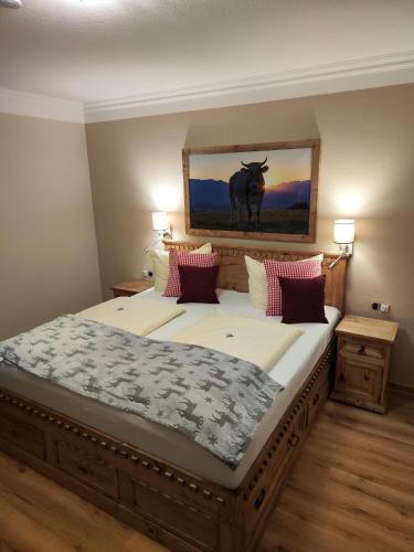 En eller flere senge i et værelse på Alpenhotel Bergzauber