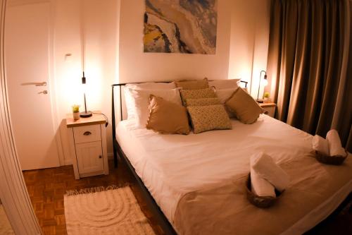 Posteľ alebo postele v izbe v ubytovaní Mina Apartment