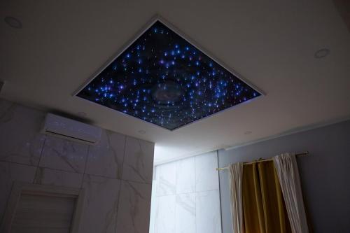 a starry ceiling in a bathroom with a shower at Enchanting Suites Salerno in Salerno