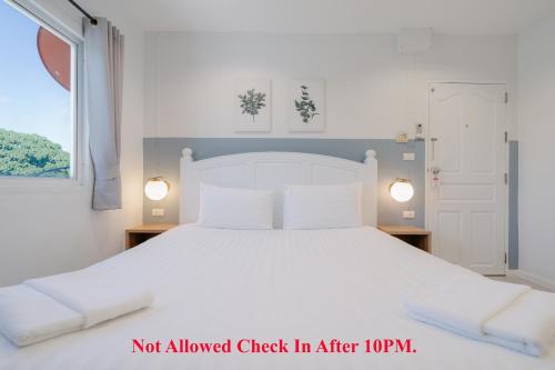 Katil atau katil-katil dalam bilik di Baan Sutra Guesthouse