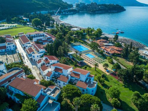 an aerial view of a resort next to the water at Hotel Aleksandar in Budva