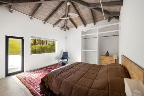 Postel nebo postele na pokoji v ubytování Villa Palmas