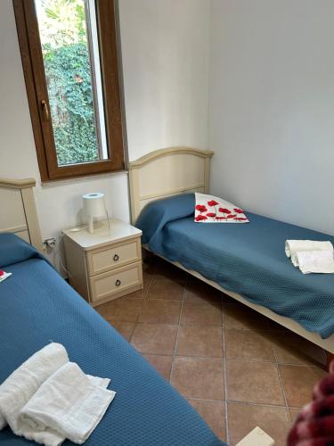 Ένα ή περισσότερα κρεβάτια σε δωμάτιο στο Villa Erika Sofja