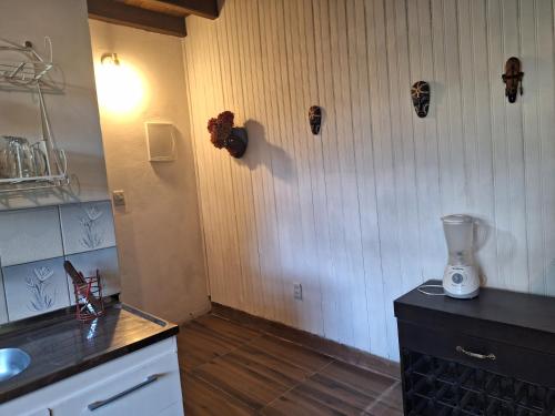 Kuchyň nebo kuchyňský kout v ubytování Cabana Gramado na Praia da Ferrugem