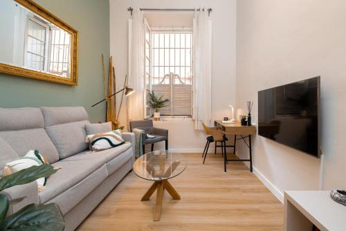 Televízia a/alebo spoločenská miestnosť v ubytovaní C60 Pretty loft in downtown