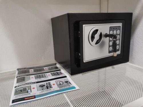 a electrical switch with a paper next to it at Chu-Cha's Rooms in Koh Samui 