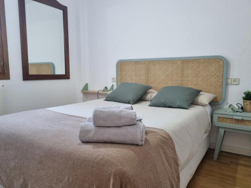 Llit o llits en una habitació de El Rincón del Alba