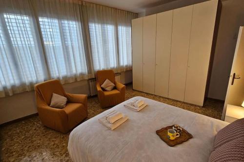 Ένα ή περισσότερα κρεβάτια σε δωμάτιο στο Monticelli apt - 6 posti letto