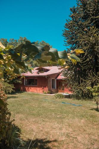 Κήπος έξω από το Huala Hosteria