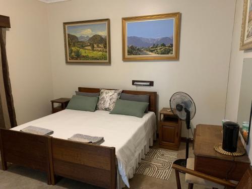 Postel nebo postele na pokoji v ubytování Hotel De Rust