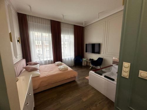 Ένα ή περισσότερα κρεβάτια σε δωμάτιο στο Apartament Glamour Prywatne Jacuzzi Starowiślna Kraków