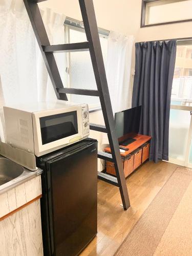 Kuchyň nebo kuchyňský kout v ubytování FUEL INN