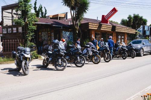 a group of motorcycles parked on the side of a street at Pousada UpSerra in Urubici